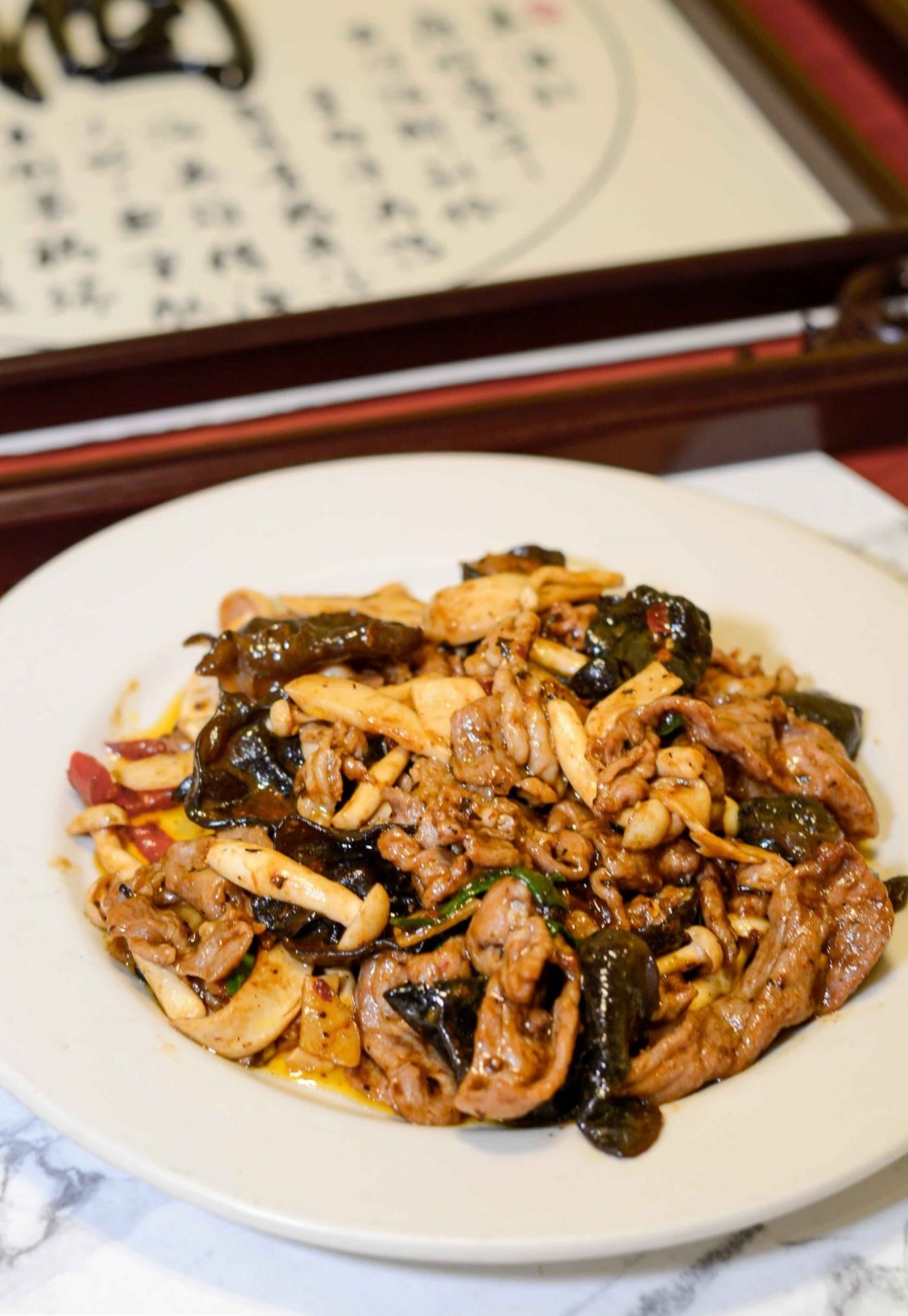Shredded pork in fish fragrant sauce with mushrooms at Asia Cafe, a Chinese Restaurant in Austin