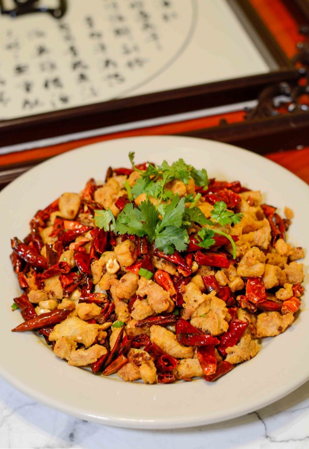 Crispy chicken with dried chilies & cilantro at Asia Cafe, a Chinese Restaurant in Austin