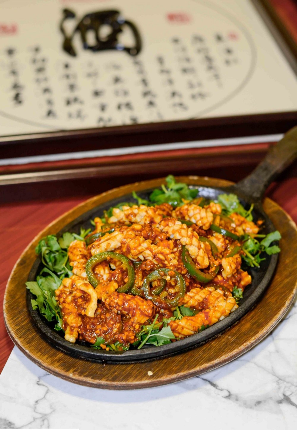 Spicy tofu & pork on sizzling hot plate at Asia Cafe, a Chinese Restaurant in Austin