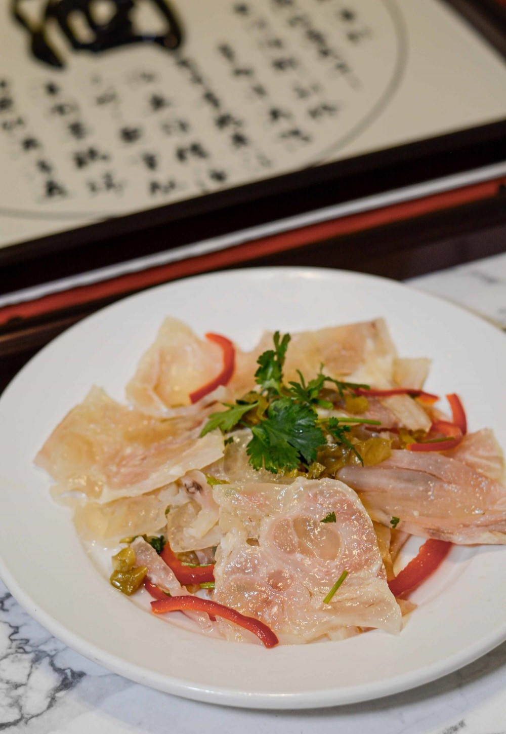 Steamed fish fillet with pickled peppers & cilantro at Asia Cafe, a Chinese Restaurant in Austin