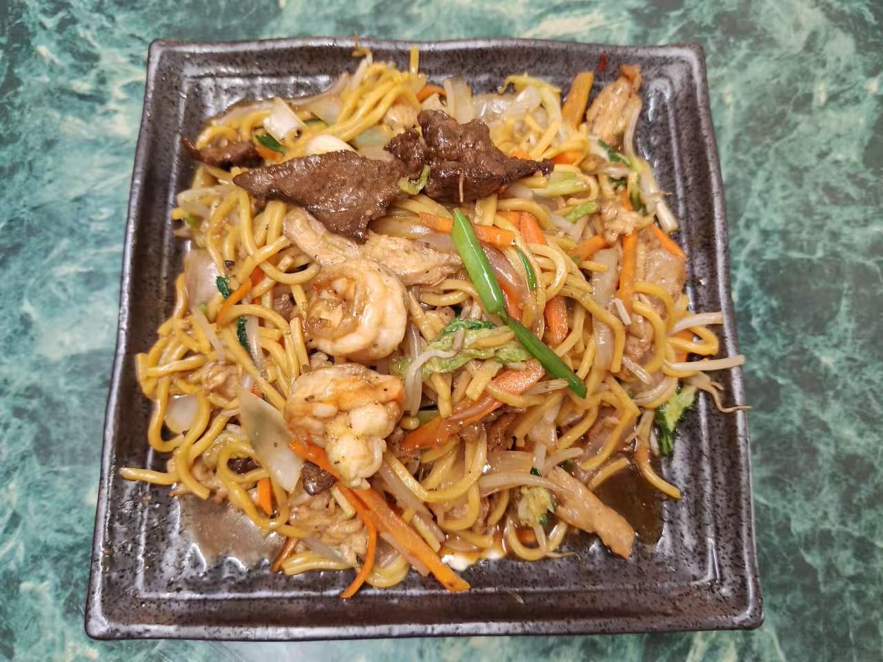 Combination lo mein noodles with shrimp, beef, pork and fresh vegetables at Asia Hibachi & Rice Bowls，an Asian Fusion Restaurant in Buffalo