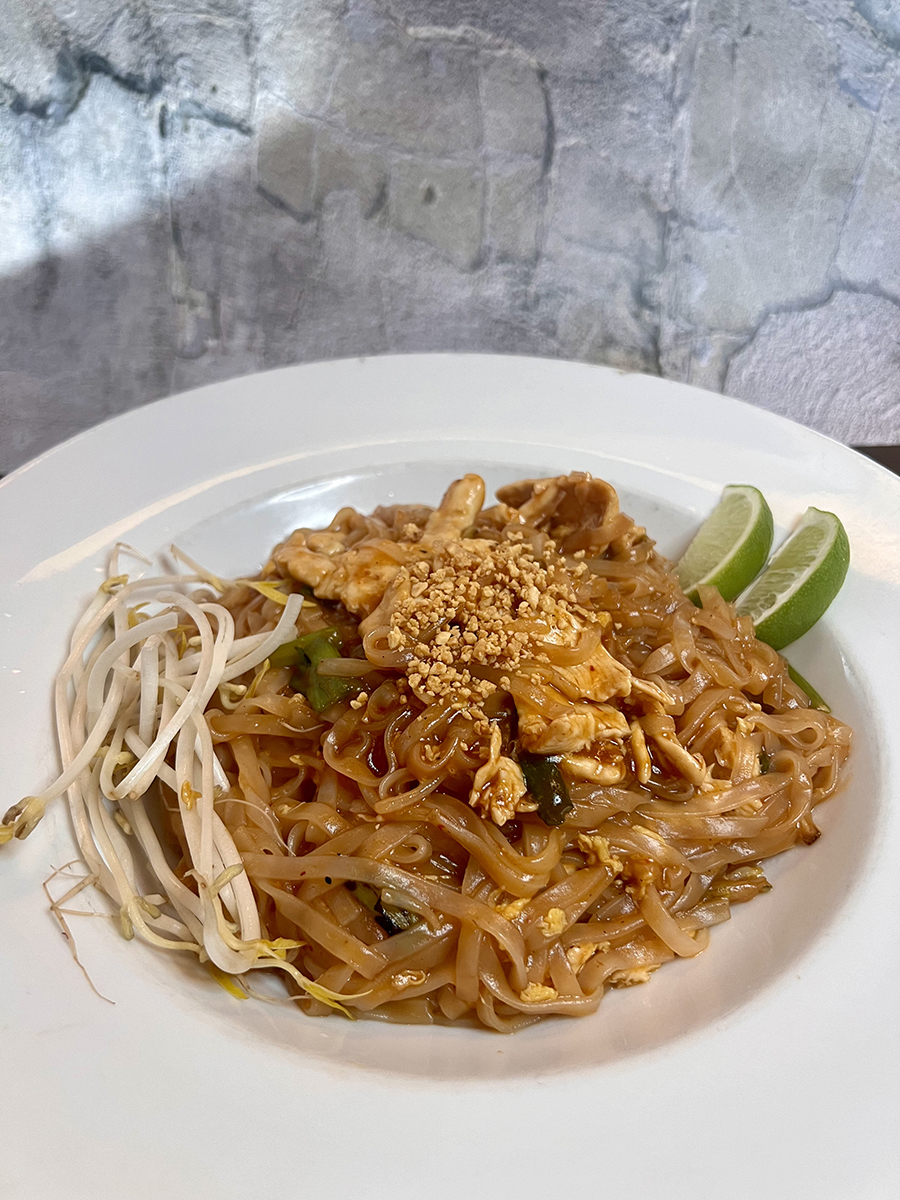 Pad thai chicken, wide rice noodles with veggies and chicken at Asian Bites Pho & Fusion Kitchen, a Asian restaurant in Smyrna