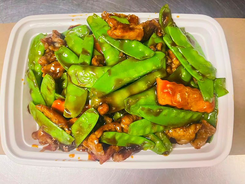 Chicken stir-fried with crisp snow peas and carrots at Asian Cuisine, a Chinese Restaurant in Kutztown