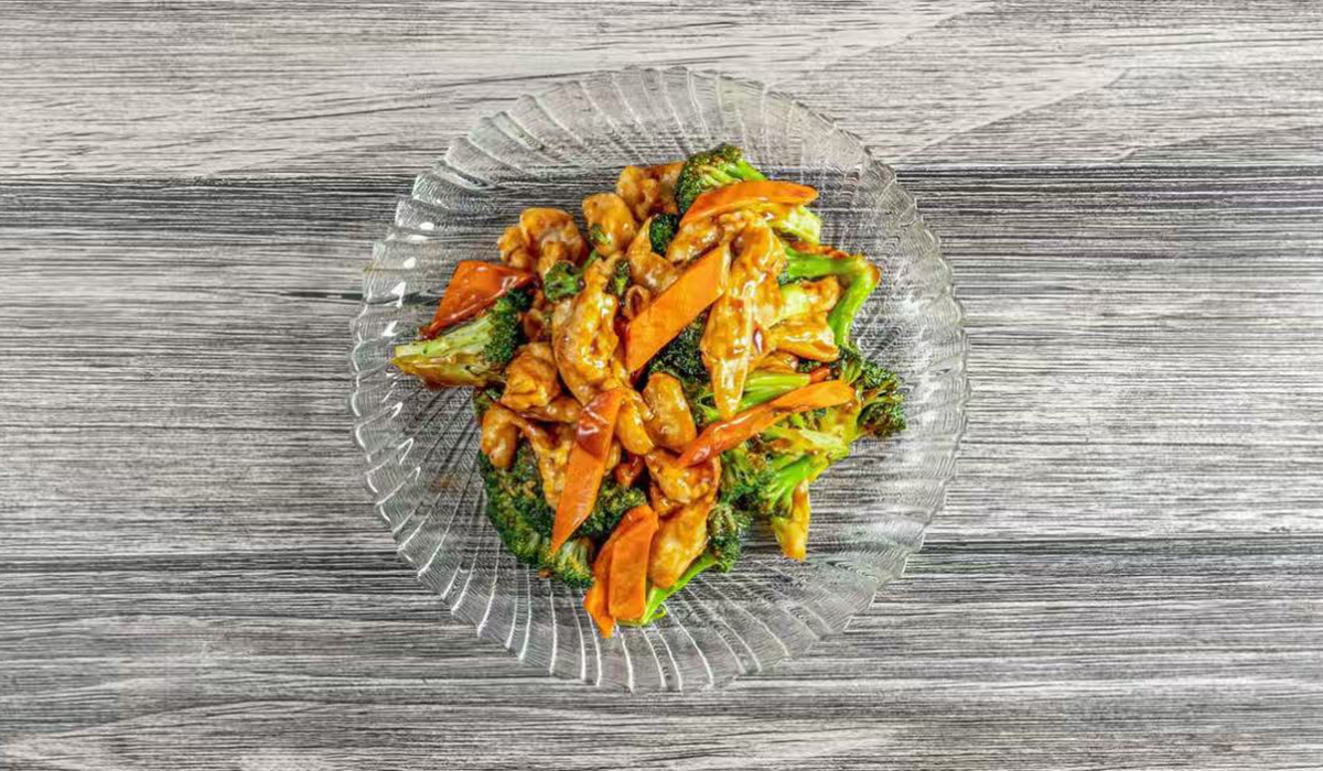 Asian-Fusion-of-Glen-Rock-Asian-Inspired-Restaurant-Chicken-with-Chinese-Broccoli-Glen-Rock Chicken and Broccoli Stir - Fry: Tender chicken pieces with broccoli in savory sauce.