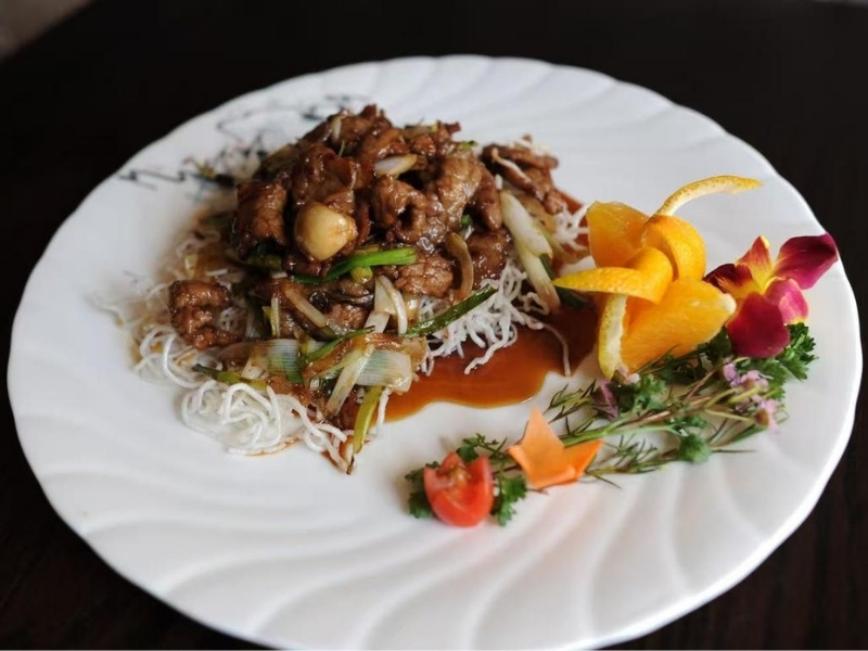 Asian-Garden-Asian-Restaurant-Mongolian-Beef-Hoschton Tender beef with scallions on crispy noodles at Asian Garden, a Asian Restaurant in Hoschton