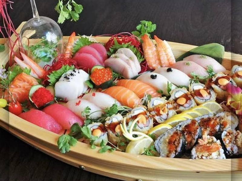 Asian-Garden-Asian-Restaurant-Sushi-&-Sashimi-Boot-For-Three-Hoschton Assorted sushi and sashimi platter for three at Asian Garden, a Asian Restaurant in Hoschton