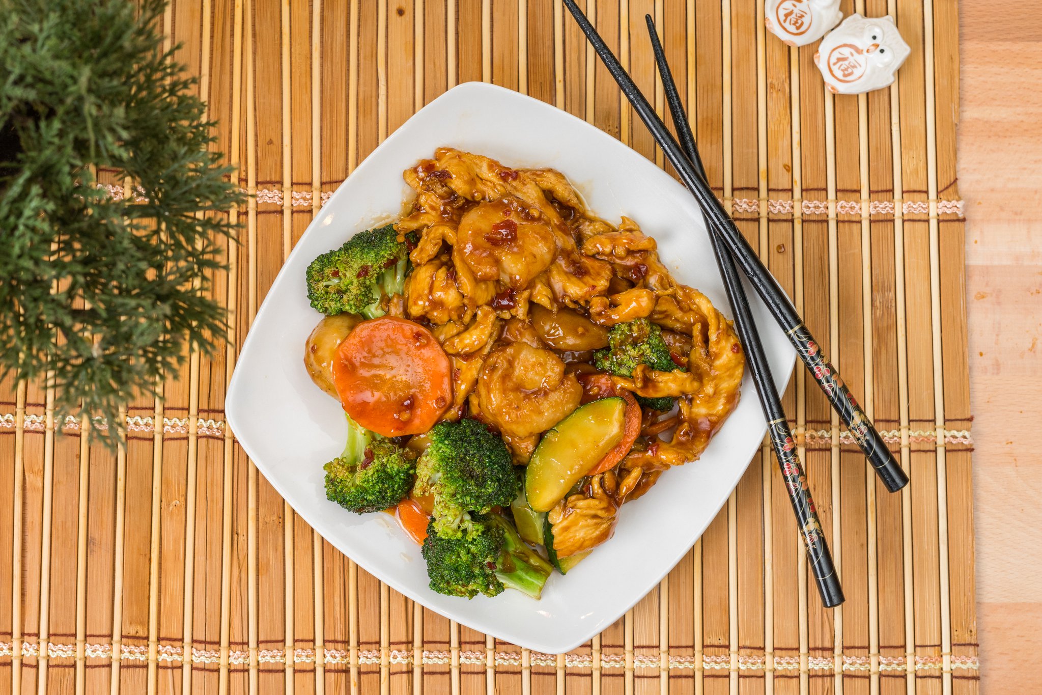 Combination stir-fry of chicken, shrimp and seasonal vegetables.