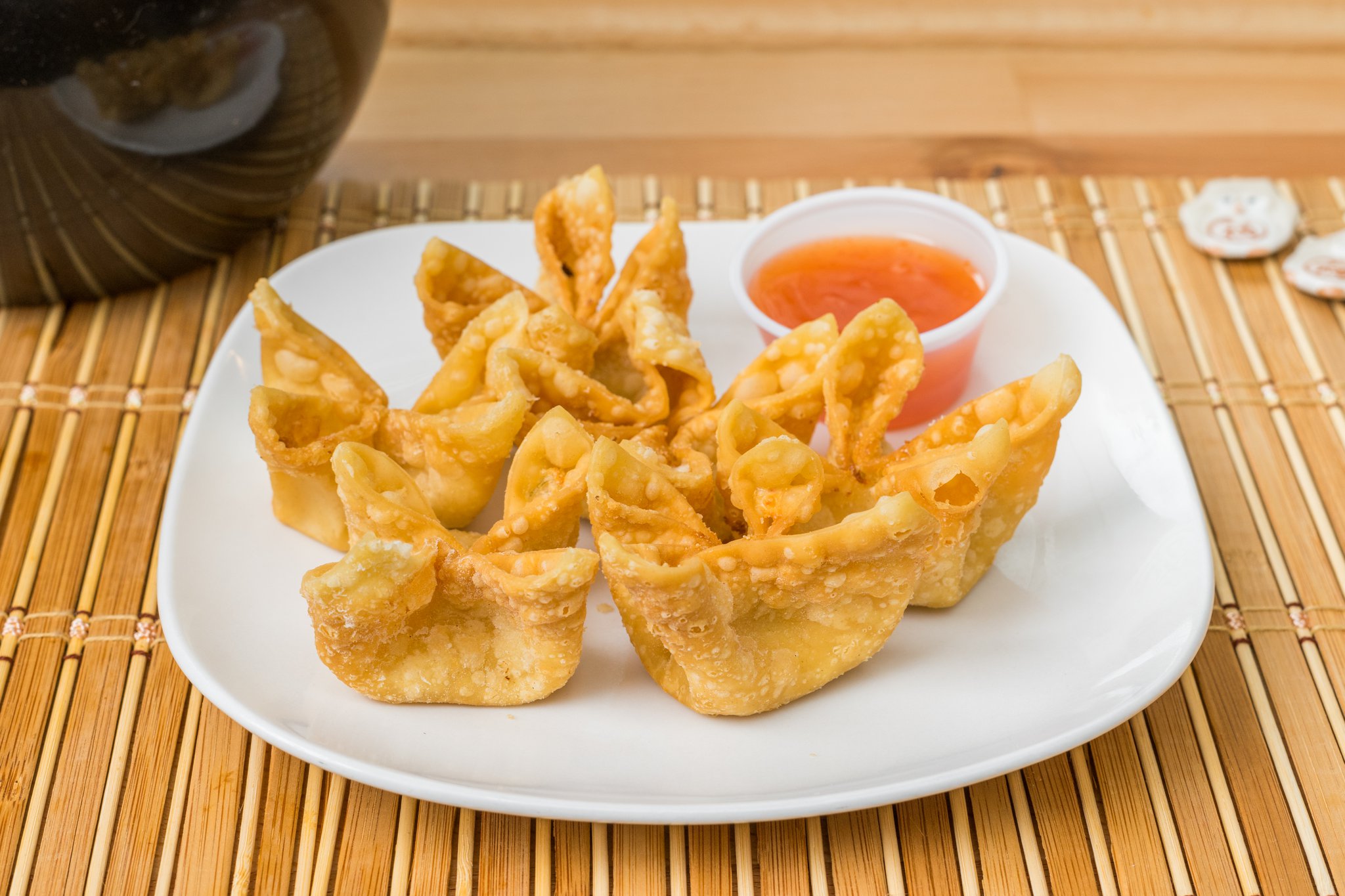 Crispy fried crab rangoon with sweet dipping sauce