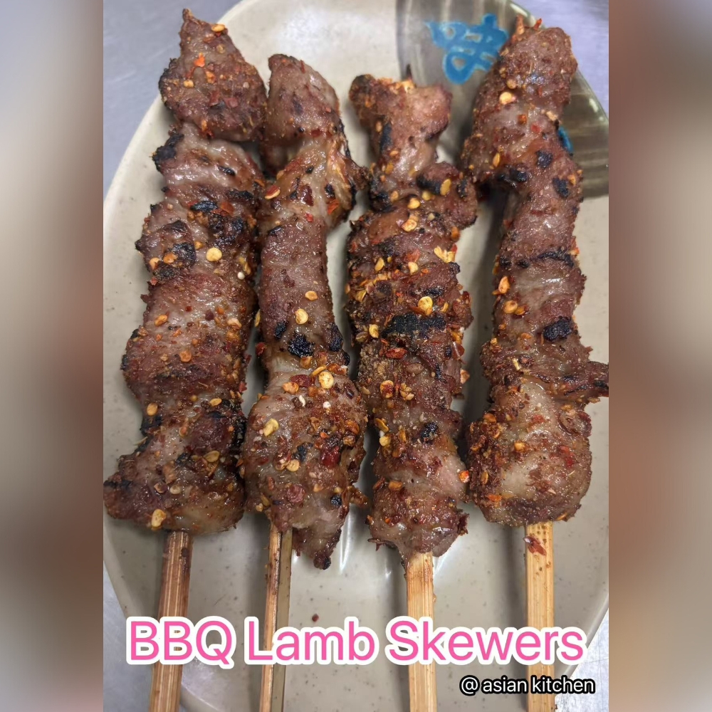 Tender lamb skewers grilled with spices, savory and flavorful at Asian Kitchen, a Asian Restaurant in Rochester