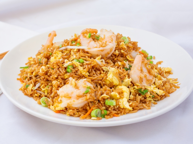 Shrimp fried rice with egg, scallions and carrots