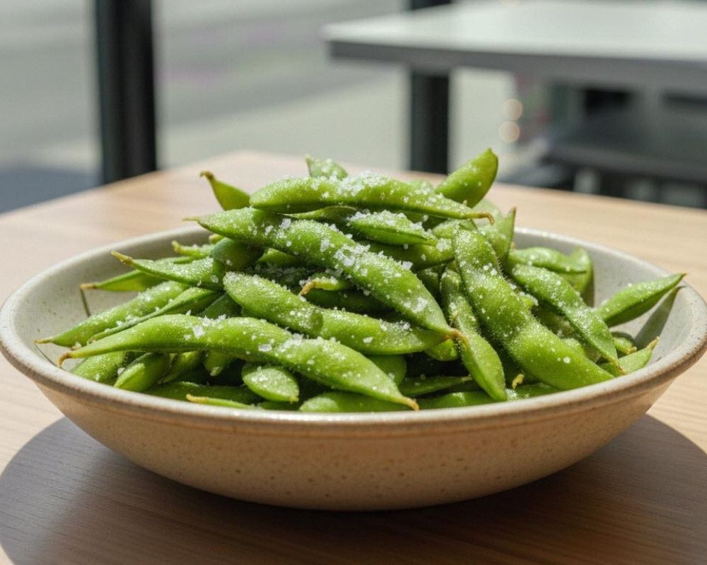 Lightly salted fresh edamame pods at AZN Bowls. Bao. Juice Bar, a Health food Restaurant in Duluth