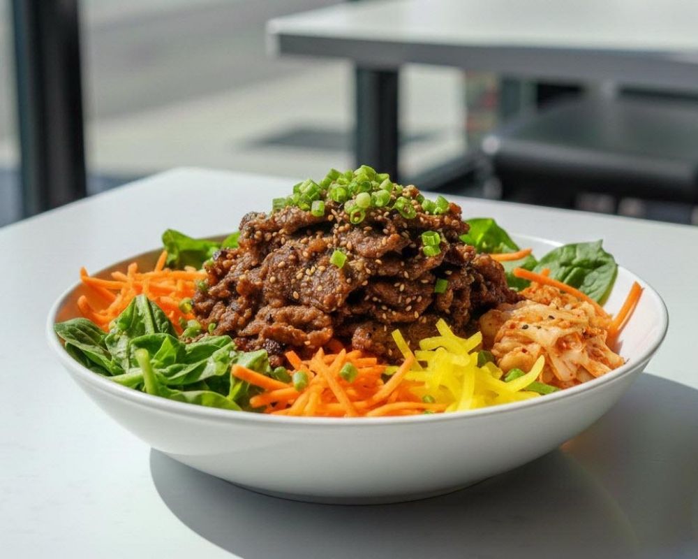 Spicy Korean beef bowl with kimchi and veggies at AZN Bowls. Bao. Juice Bar, a Health food Restaurant in Duluth