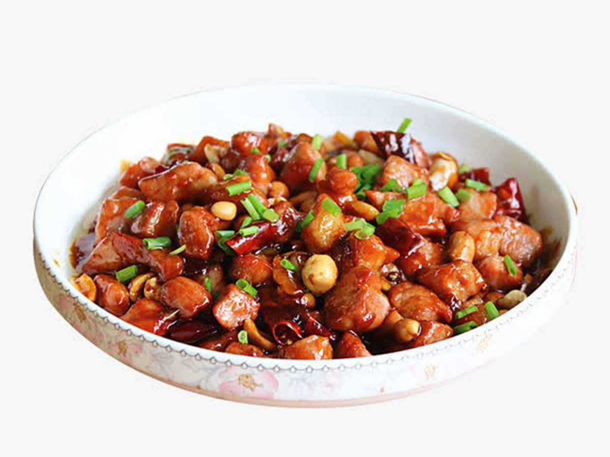 Kung Pao chicken with peanuts, dried chili and chopped green onions in a ceramic bowl at Bamboo Express, a Chinese Restaurant in Bellingham