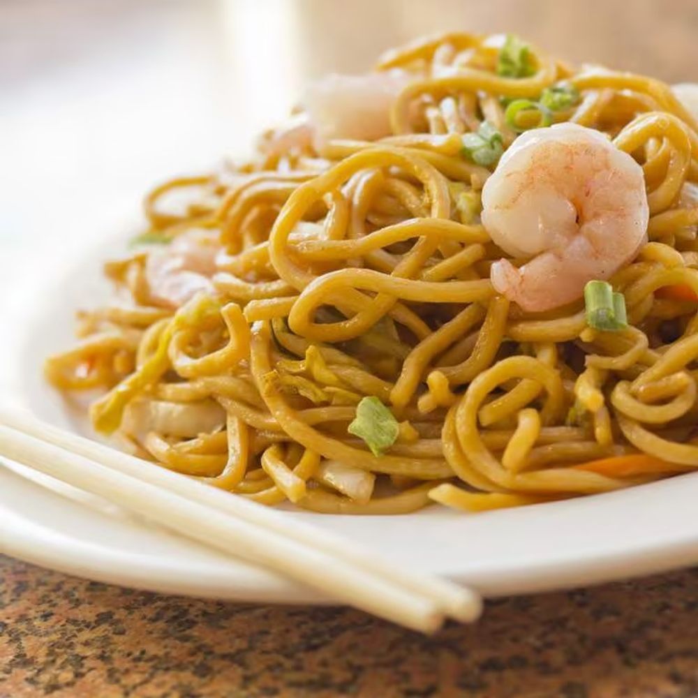 Shrimp lo mein noodles topped with a whole cooked shrimp and green onions at Bamboo Moon Chinese&Japanese Bubble Tea, an Asian Fusion Restaurant in Randolph