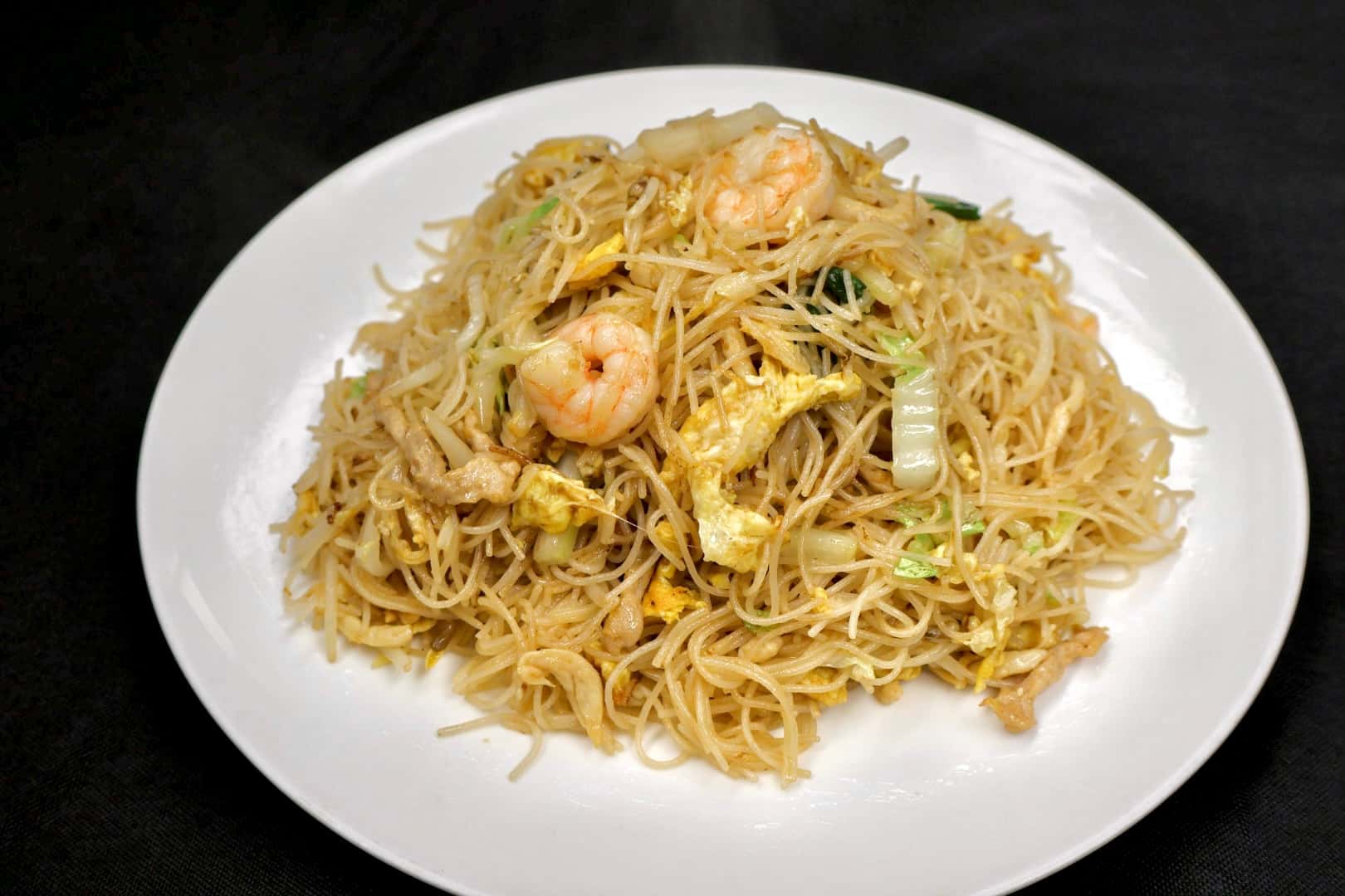 Fried rice noodles with shrimp, chicken, eggs and cabbage at Bao House, a Chinese Restaurant in Stillwater