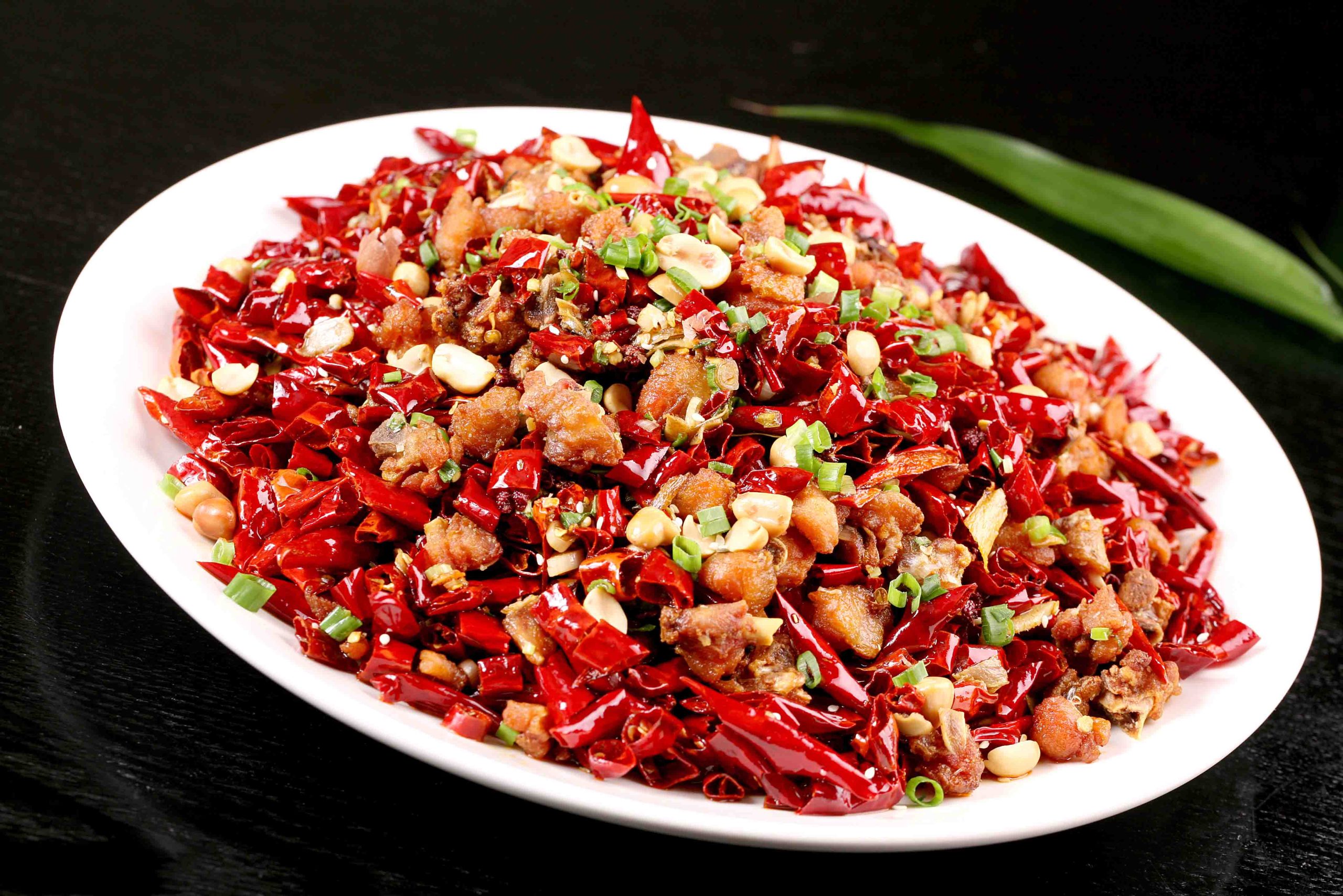 Spicy fried chicken with dried chilies and peanuts at Bao House, a Chinese Restaurant in Stillwater