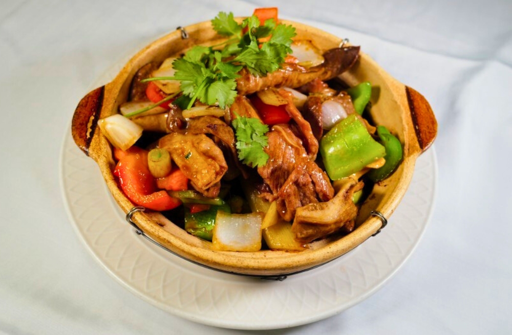 Tender beef offal with vegetables in clay pot, savory and aromatic at Bao Kee Restaurant, a Chinese Restaurant in Hacienda Heights