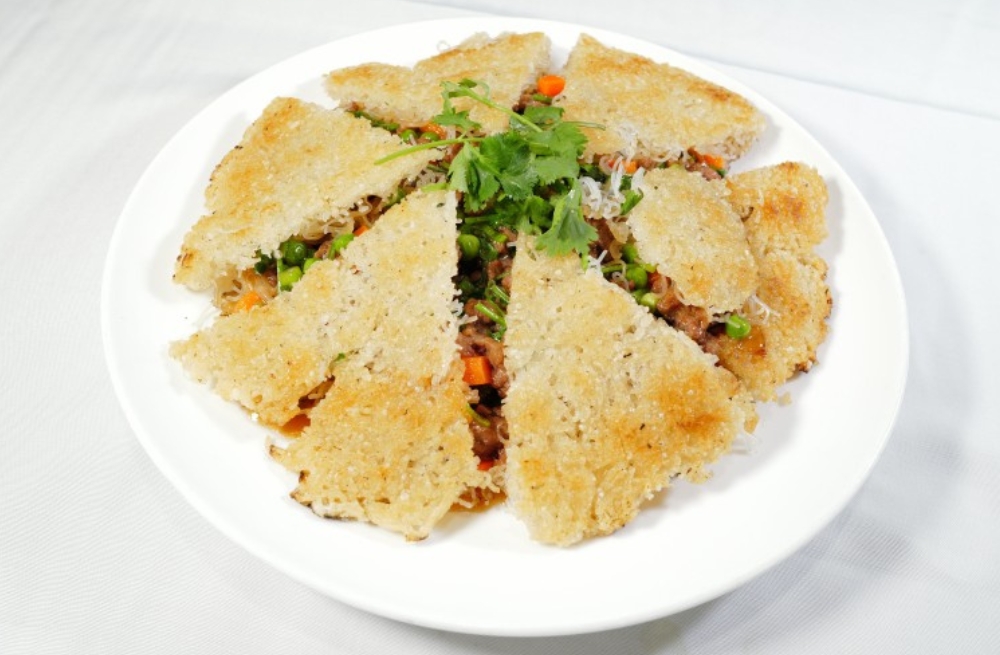 Crispy rice cakes with meat and vegetable filling, garnished with cilantro at Bao Kee Restaurant, a Chinese Restaurant in Hacienda Heights