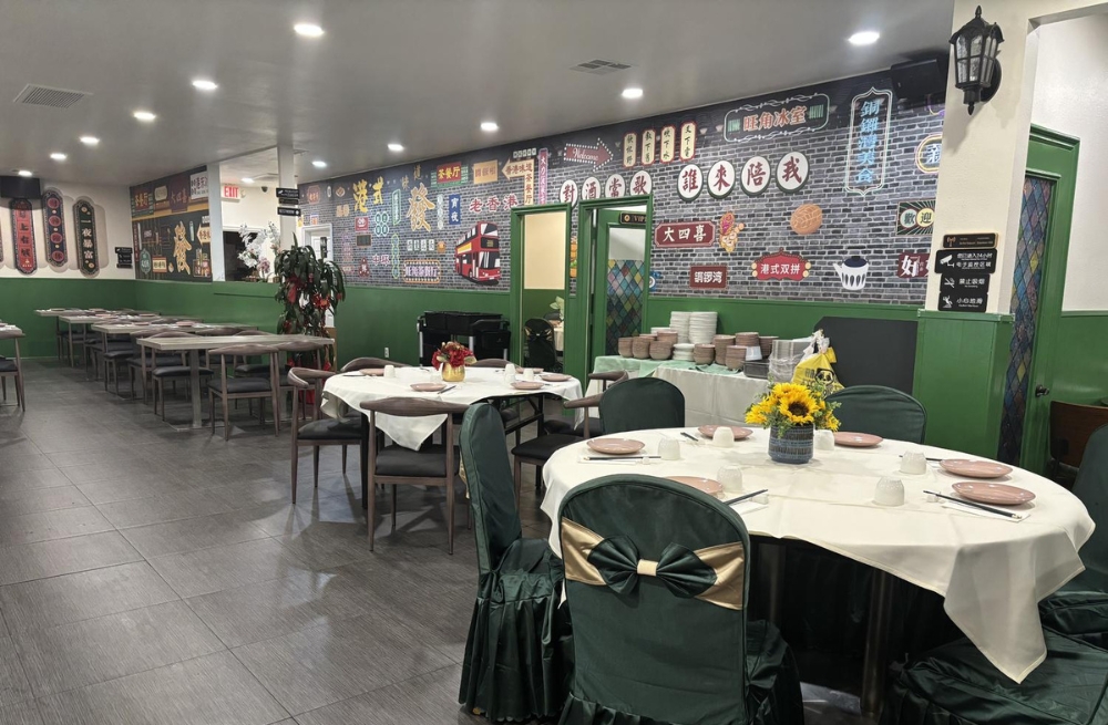 Elegant dining area with themed murals, round tables with white tablecloths and flower decorations at Bao Kee Restaurant, a Chinese Restaurant in Hacienda Heights