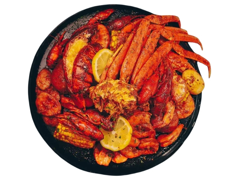 Spicy seafood boil platter with crab legs, shrimp, corn and potatoes at Bayou Crab, a Seafood Restaurant in Lake Jackson