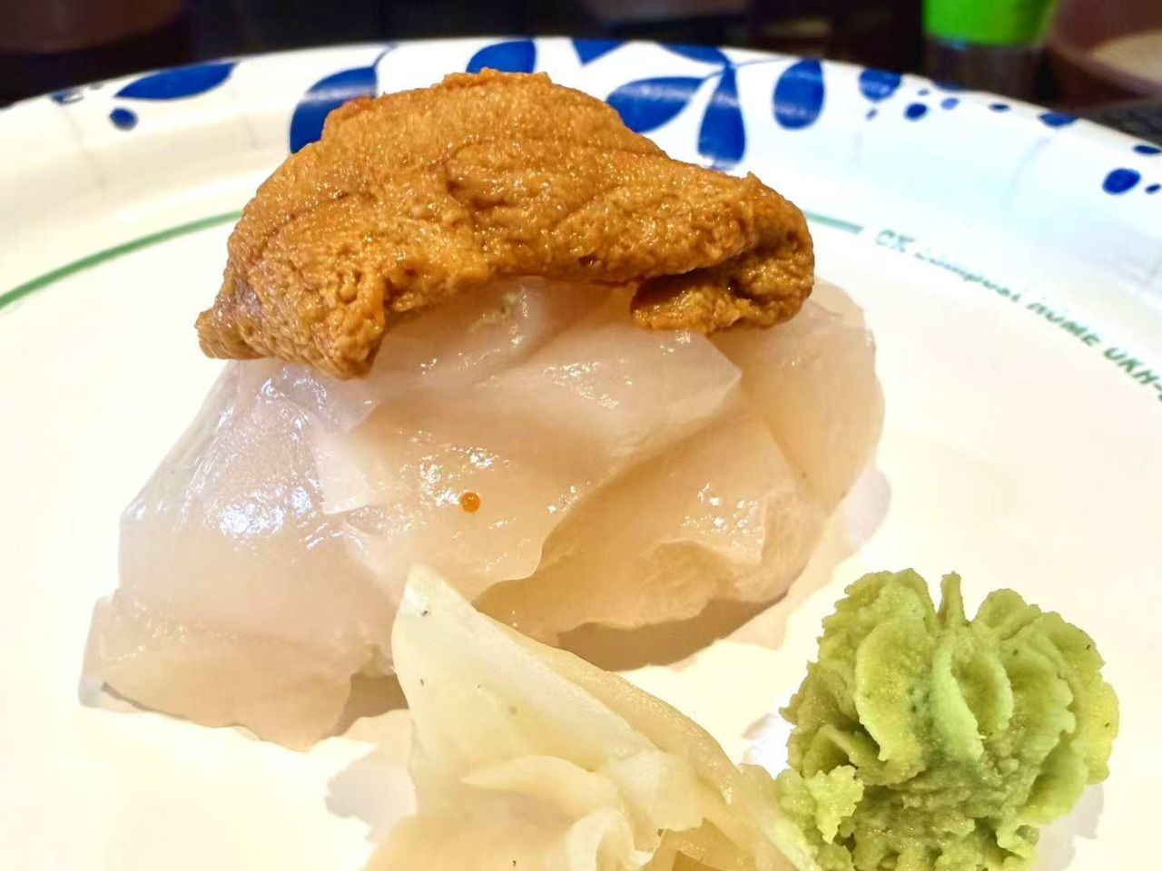 White fish nigiri topped with fresh sea urchin at Bayou Fresh Seafood Grill & Sushi a Asian Fusion Restaurant in Jasper
