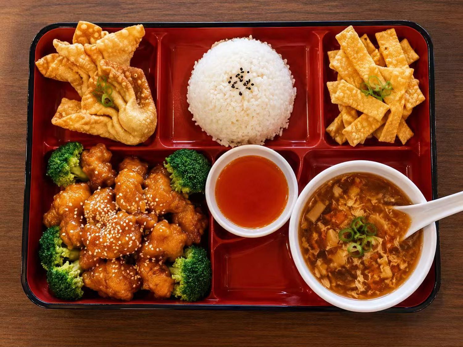 Sesame Chicken Bento Box at Bento Teppanyaki, Asian Restaurant in Austin