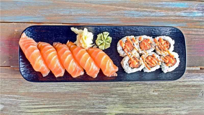 Salmon Sushi Platter - Salmon sashimi and spicy salmon rolls served with wasabi and ginger at Bestea & Sushi, a Japanese restaurant in Oviedo