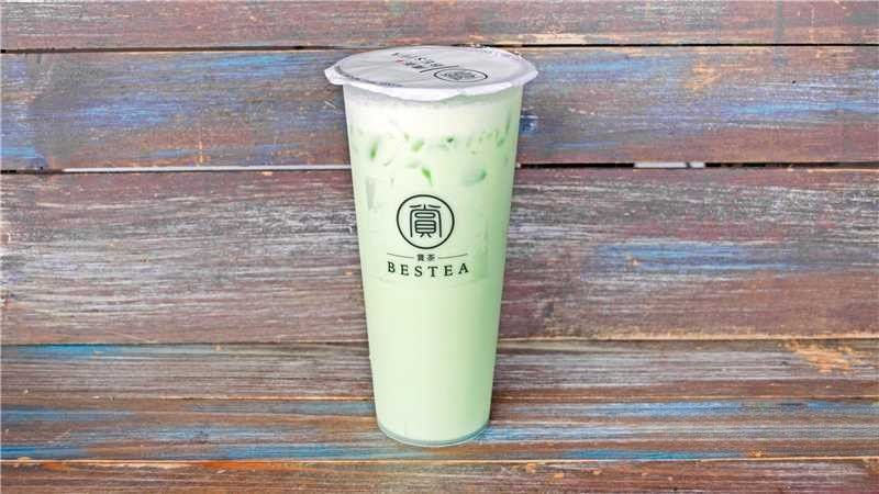 Honey Dew Milk Tea - Light green honeydew - flavored milk tea with ice at Bestea & Sushi, a Japanese restaurant in Oviedo