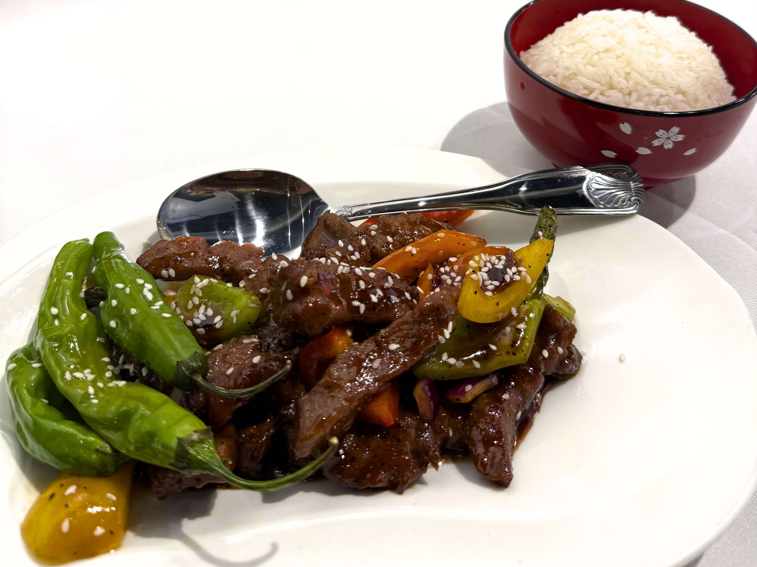 Big-8-Chinese-Restaurant-Mongolian-Beef-Lincoln Savory Mongolian beef with peppers and sesame seeds at Big 8, a Chinese Restaurant in Lincoln