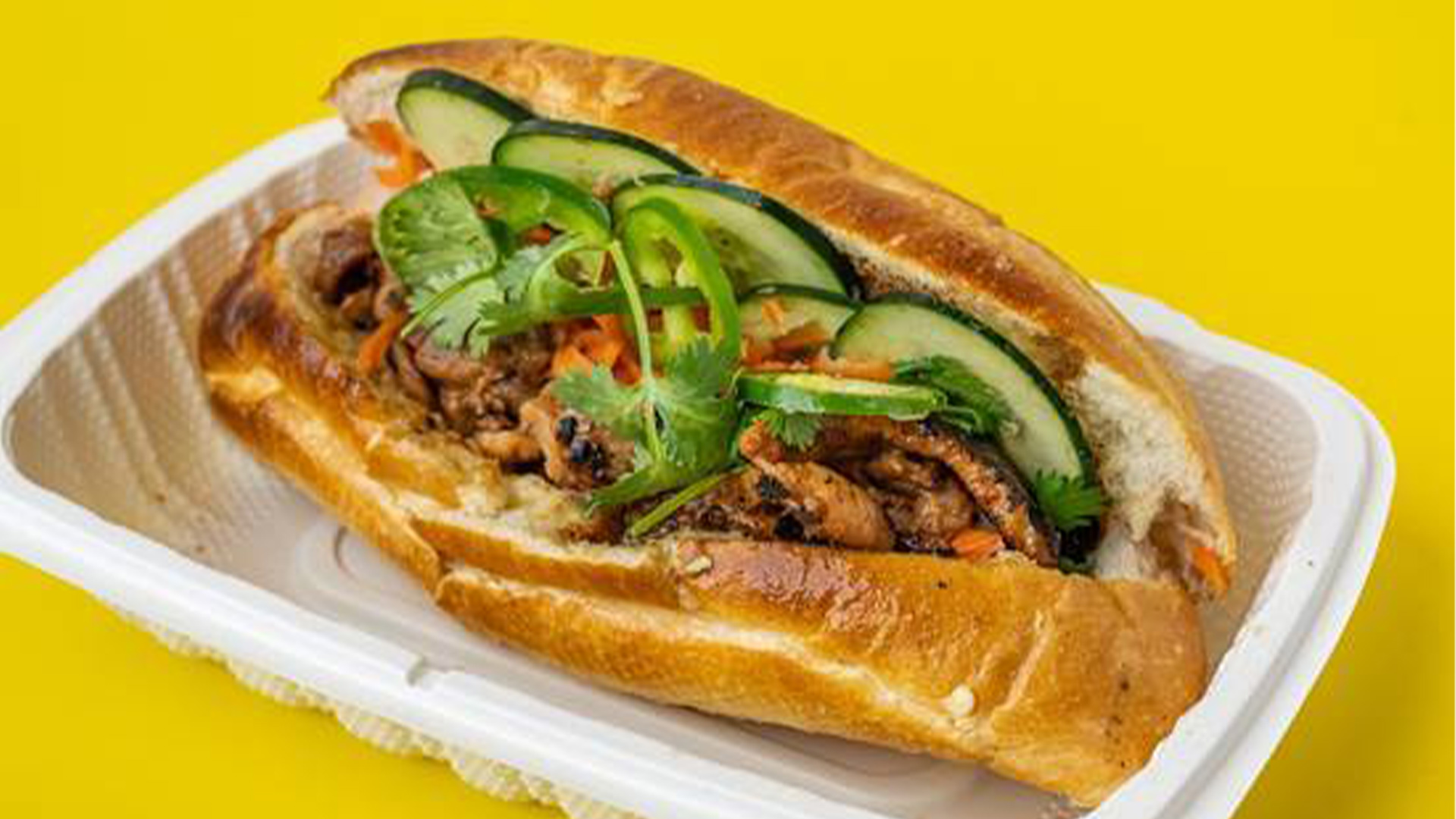 Big-Boss-Banh-Mi-Vietnamese-Restaurant-BBQ-Chicken-Banh-Houston BBQ chicken banh mi with veggies at Big Boss Banh Mi, a Vietnamese Restaurant in Houston