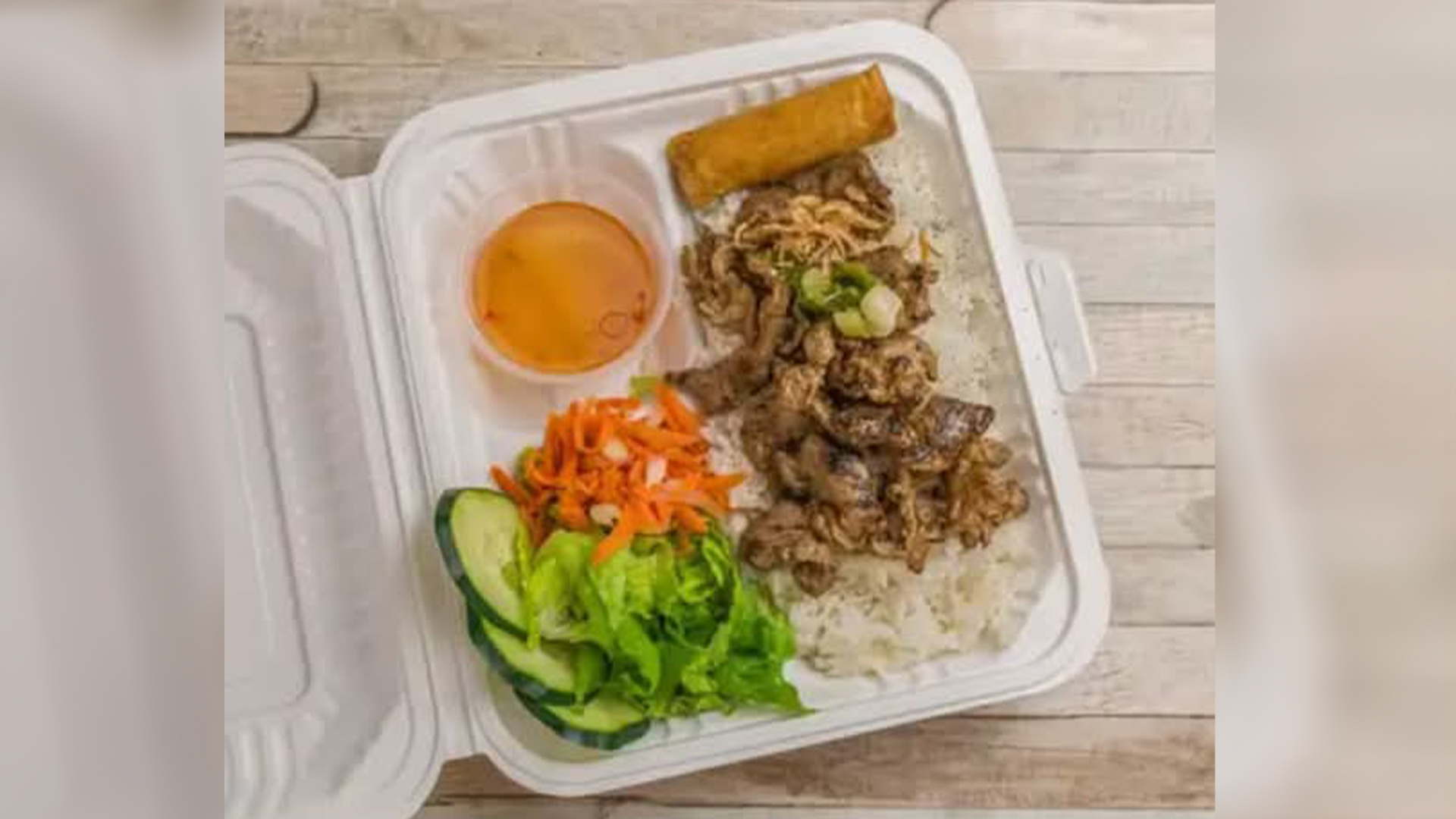 Big-Boss-Banh-Mi-Vietnamese-Restaurant-BBQ-Chicken-Houston BBQ chicken with rice, veggies, egg roll at Big Boss Banh Mi, a Vietnamese Restaurant in Houston
