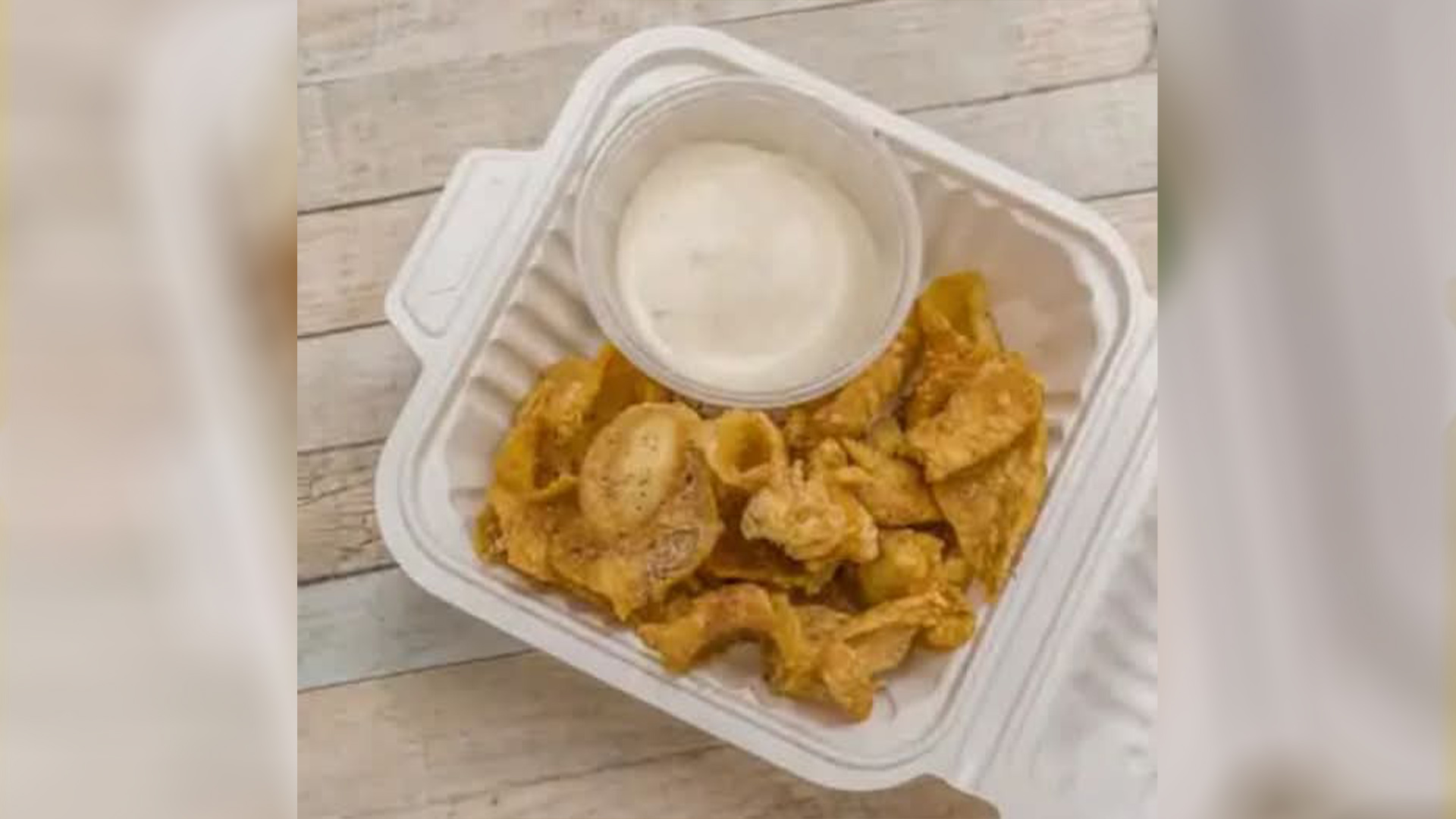 Crispy chicken skin chips with dip at Big Boss Banh Mi, a Vietnamese Restaurant in Houston
