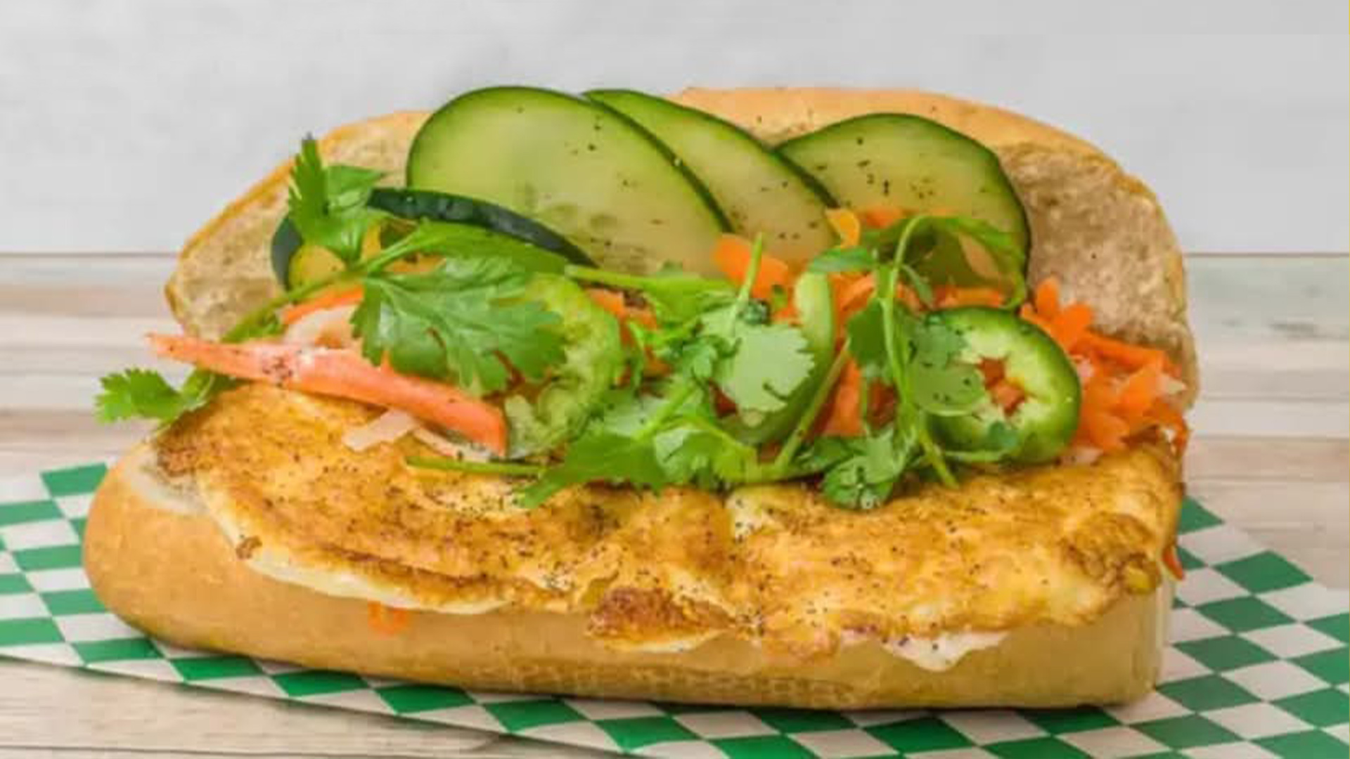 Big-Boss-Banh-Mi-Vietnamese-Restaurant-Fried-Egg-Banh-Houston Banh mi with fried egg, veggies, cilantro at Big Boss Banh Mi, a Vietnamese Restaurant in Houston