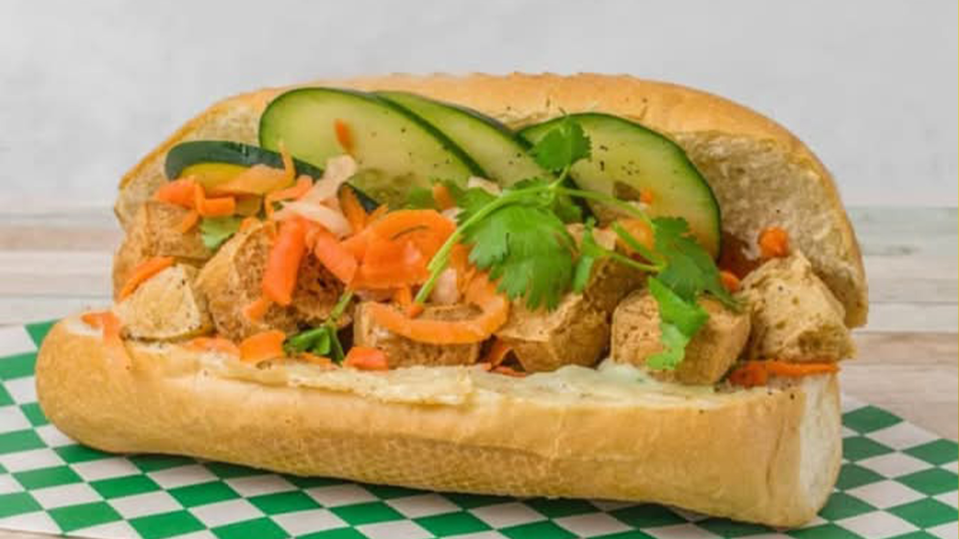 Big-Boss-Banh-Mi-Vietnamese-Restaurant-Fried-Tofu-Banh-Houston Fried tofu banh mi with veggies, cilantro at Big Boss Banh Mi, a Vietnamese Restaurant in Houston