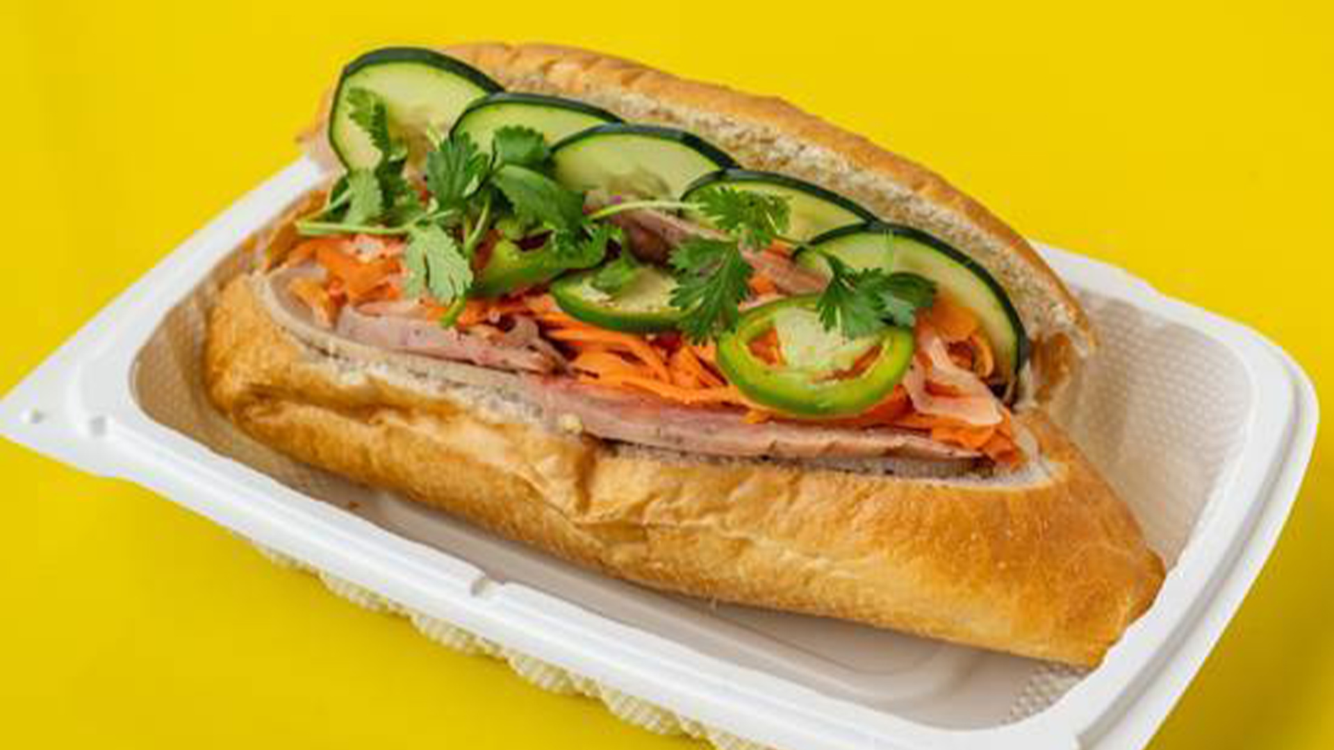 Big-Boss-Banh-Mi-Vietnamese-Restaurant-Old-School-Banh-Houston Banh mi with veggies, meat, cilantro at Big Boss Banh Mi, a Vietnamese Restaurant in Houston
