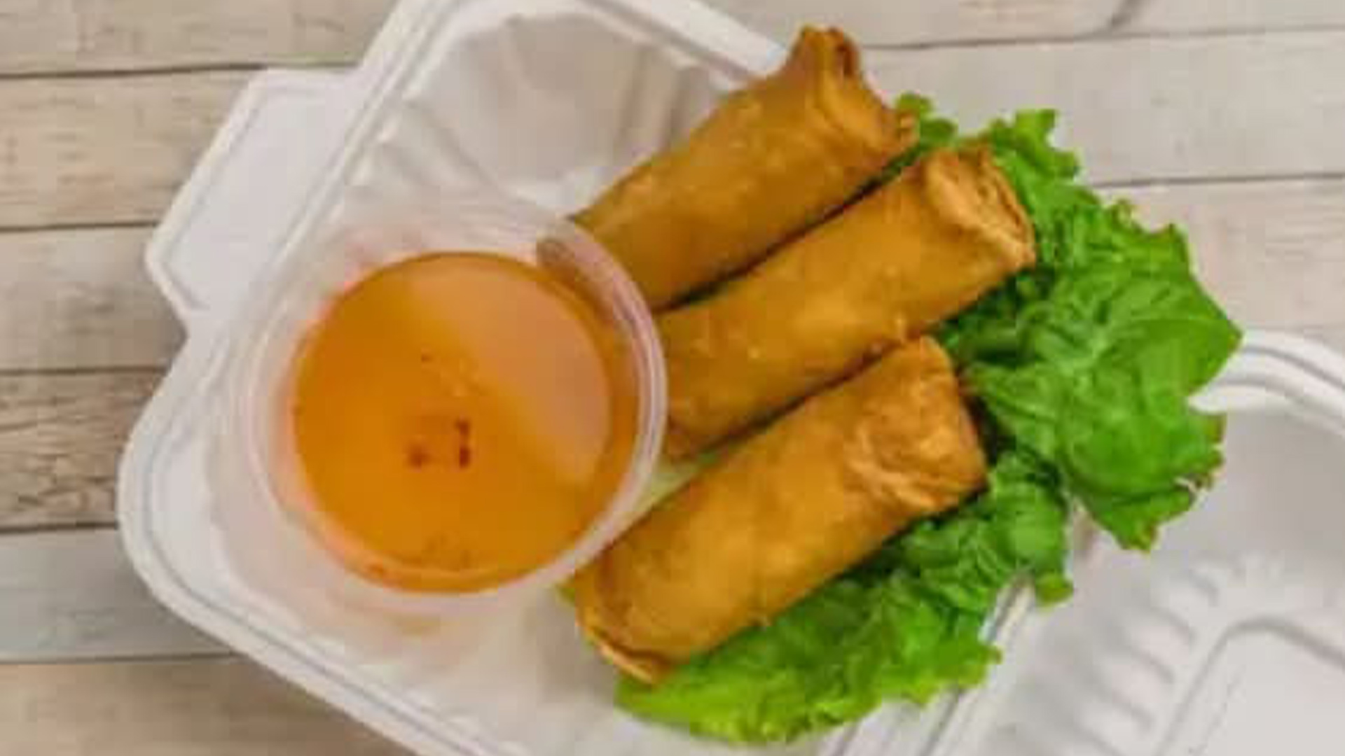 Big-Boss-Banh-Mi-Vietnamese-Restaurant-Vietnamese-Egg-Rolls-Houston Vietnamese egg rolls with lettuce, dip at Big Boss Banh Mi, a Vietnamese Restaurant in Houston