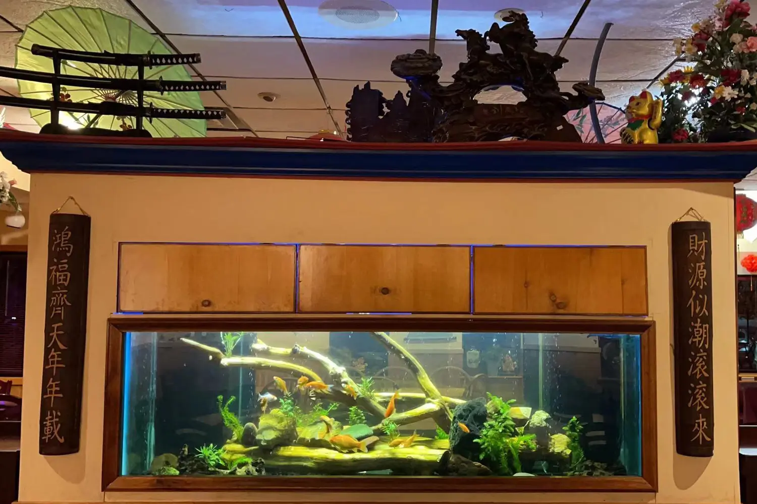 Central fish tank with Chinese scroll couplets at Beijing Restaurant，a Chinese Restaurant in San Antonio