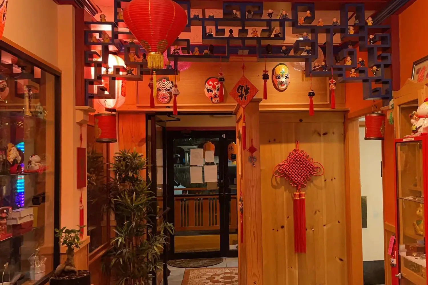 Entrance hallway with Peking opera masks and Chinese knots at Beijing Restaurant，a Chinese Restaurant in San Antonio