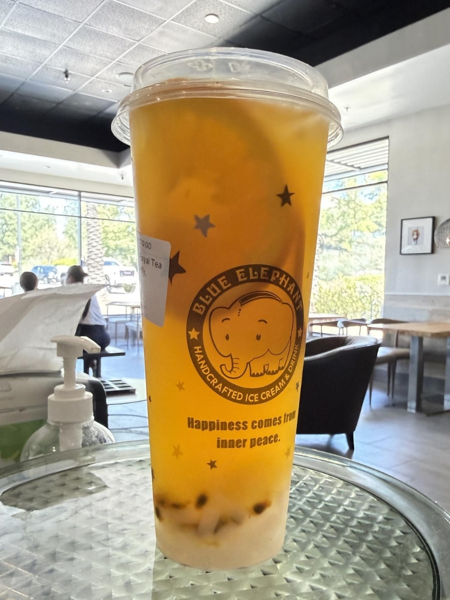 Labeled Passion Fruit Royal Tea with lychee jelly in a cup at Blue Elephant Thai Ice Cream and Drink, a Ice cream shop in Murrieta