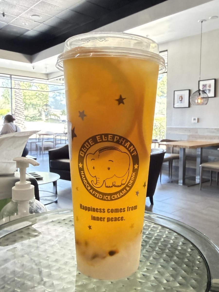 Passion Fruit Royal Tea with lychee jelly in a cup at Blue Elephant Thai Ice Cream and Drink, a Ice cream shop in Murrieta