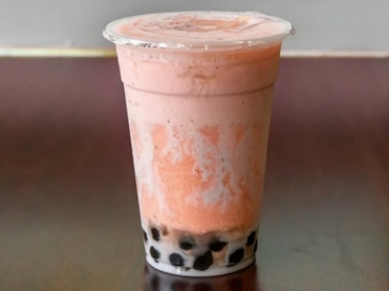 Creamy peach boba slush with tapioca pearls at Boba Loca, a Cafe in Valley Glen