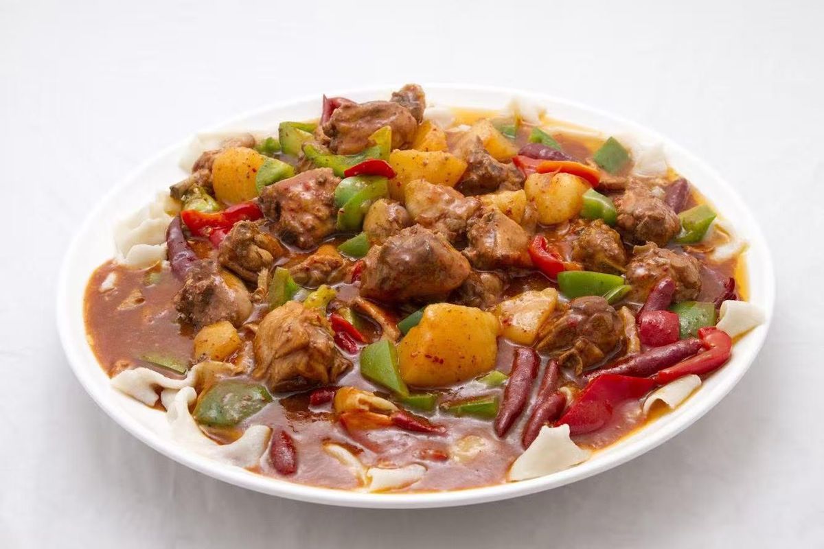 Spicy chicken and potato noodles at Bogda Uyghur Restaurant, a Chinese Halal Restaurant in Plano