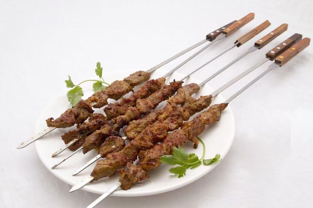 Spicy grilled lamb skewers at Bogda Uyghur Restaurant, a Chinese Halal Restaurant in Plano