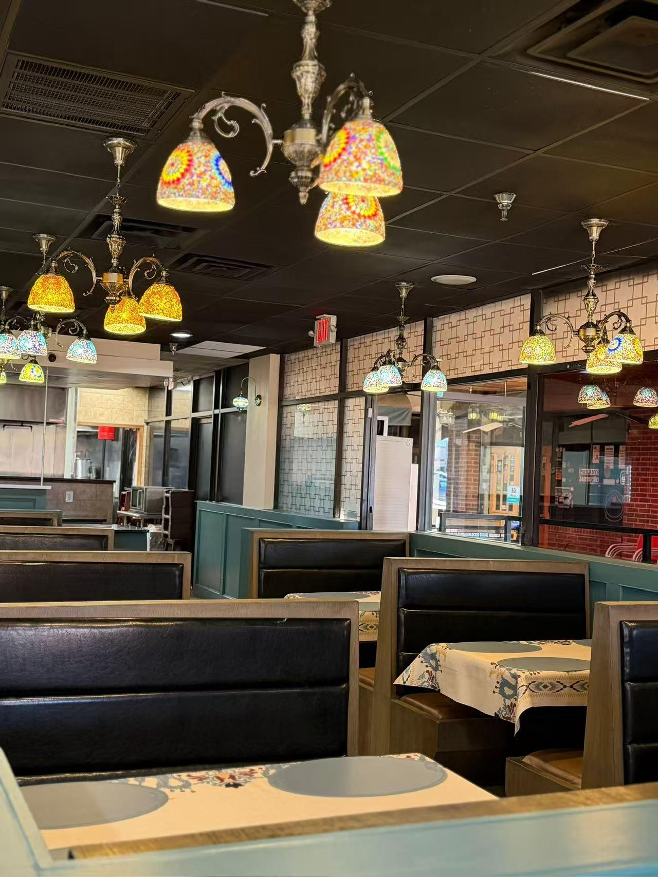 Colorful mosaic lighting in the dining room at Bogda Uyghur Restaurant, a Chinese Halal Restaurant in Plano