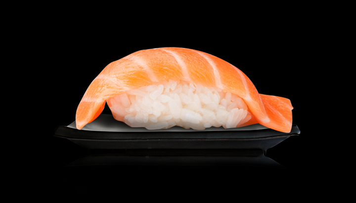 2 pieces of salmon nigiri at Botan Sushi, a Japanese Restaurant in Irvine