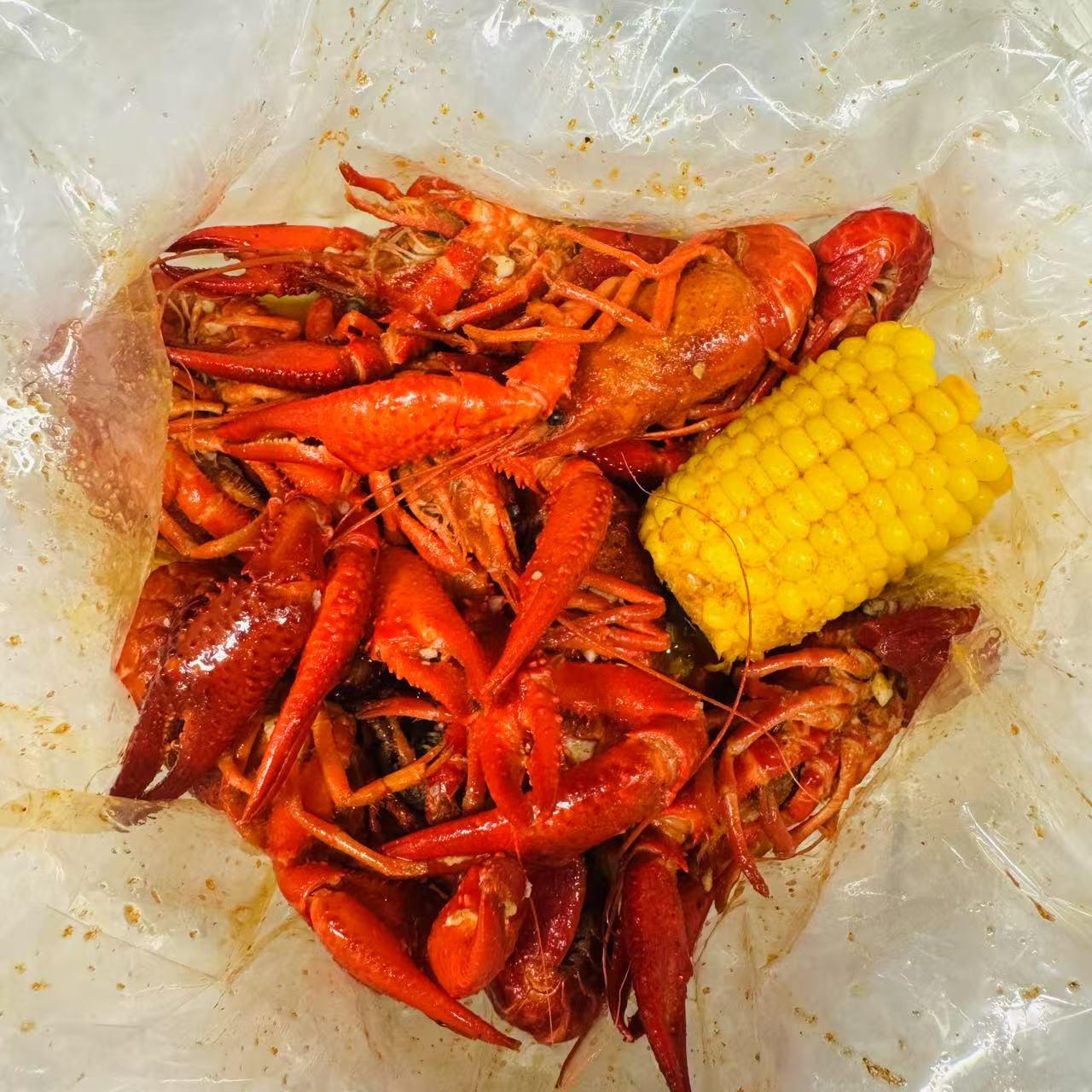 Cajun-Corner-seafood-restaurant-Crawfish-Fries-Everett Crawfish Spicy crawfish boil with corn and potatoes at Cajun Corner, a seafood Restaurant in Everett