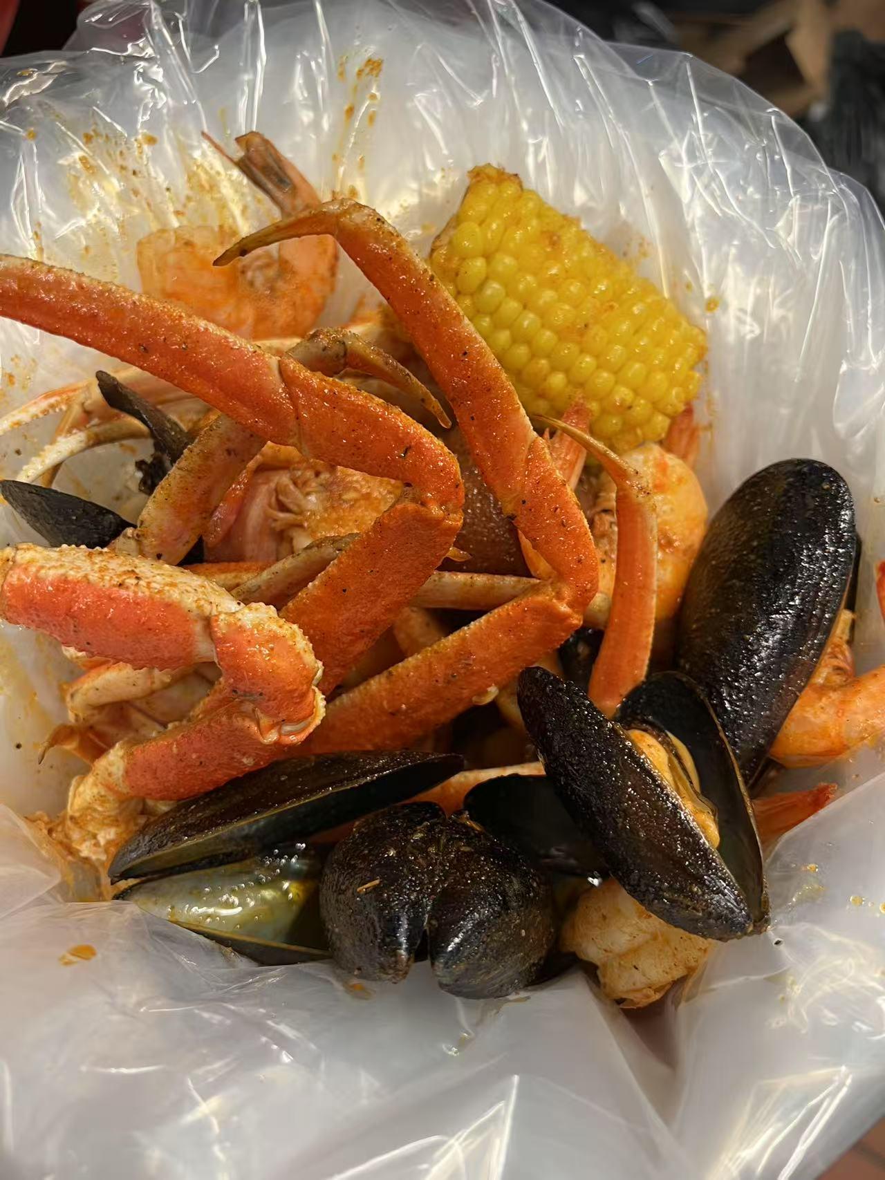 Cajun-Corner-seafood-restaurant-Seafood-Combo-1-Everett Seafood Combo 1 Mixed seafood with crab, shrimp, sausages and corn at Cajun Corner, a seafood Restaurant in Everett
