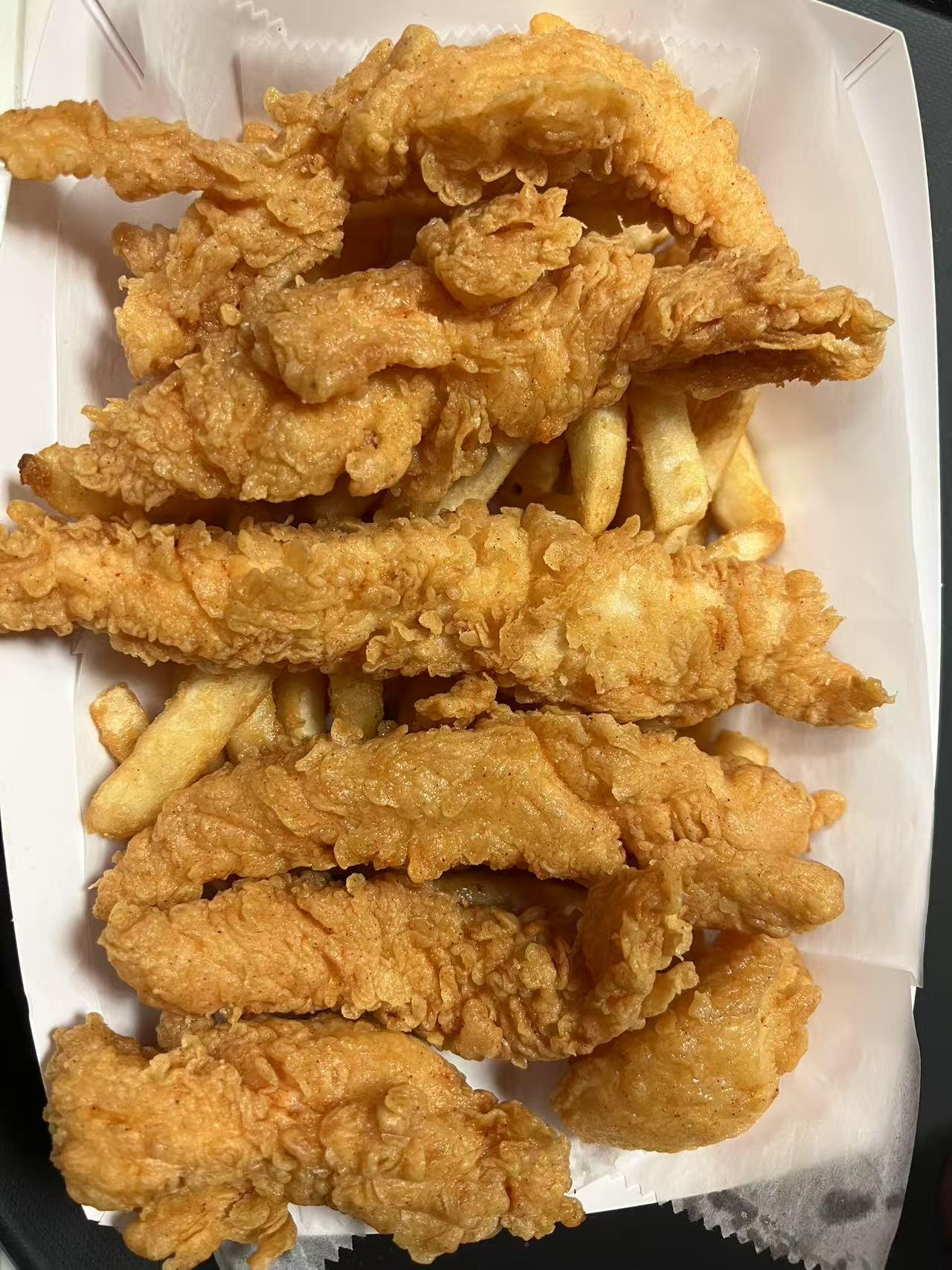 Cajun-Corner-seafood-restaurant-Chicken-Tenders-With-Fries-Everett Chicken Tenders With Fries Crispy tenders served with fries at Cajun Corner, a seafood Restaurant in Everett