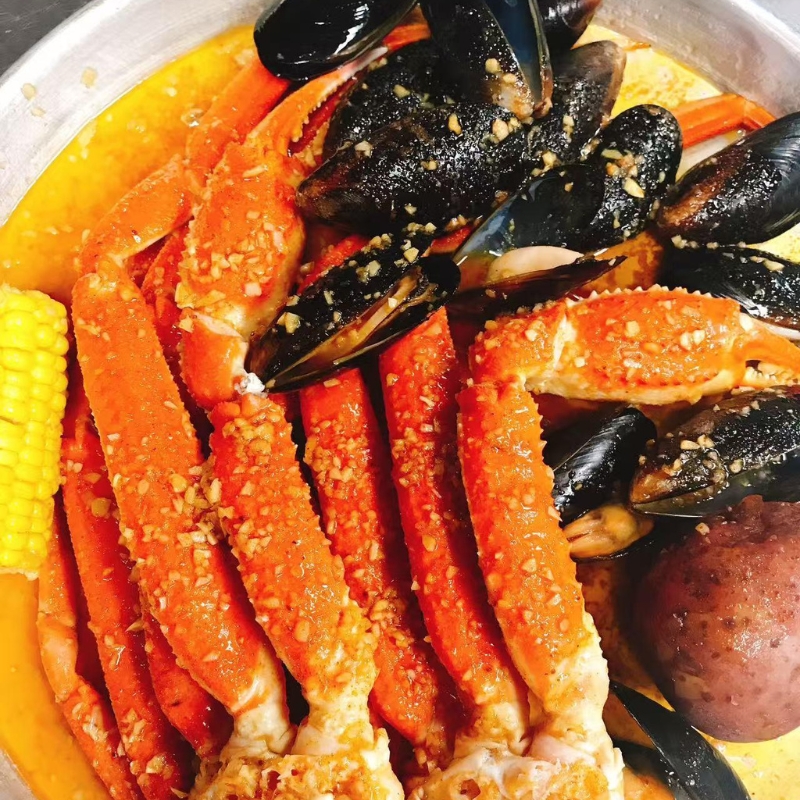 Garlic snow crab legs with mussels and corn at Cajun Express, a Seafood Restaurant in St Paul