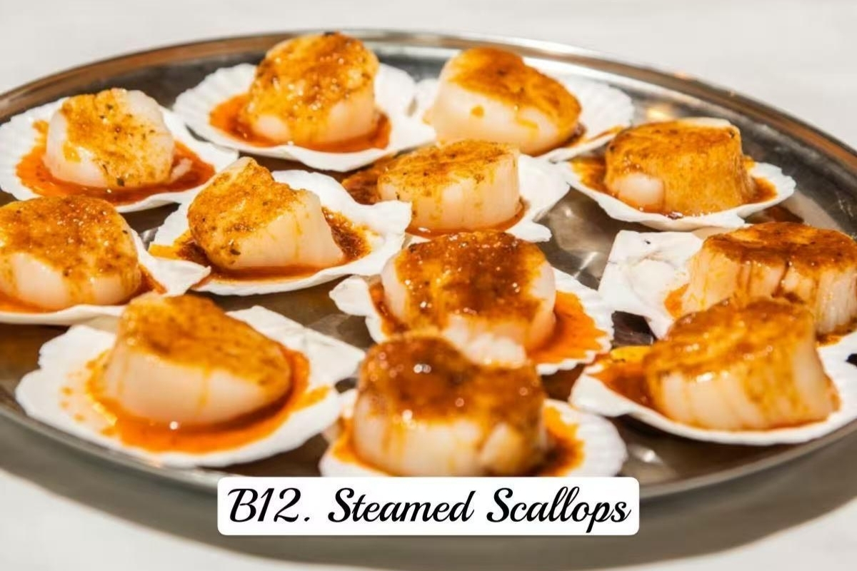Seasoned steamed scallops on scallop shells at Cajun Express, a Seafood Restaurant in St Paul